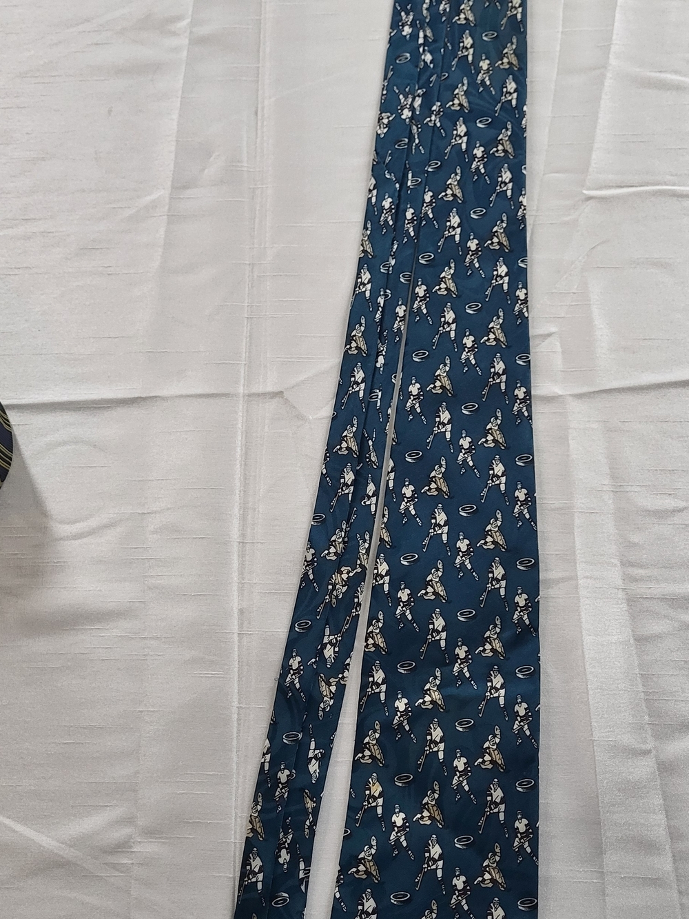 Classico Teal Hockey Player Pattern Tie with Cream and Maroon Details